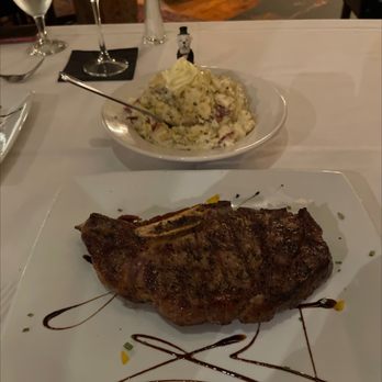Mill Pond Steakhouse - Bone in rib-eye steak and garlic mashed potatoes. - Steakhouses Near Me - Rembert, South Carolina