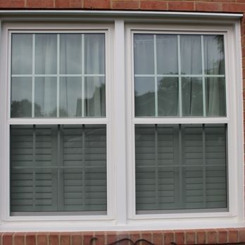 Window World of Harford - White double hung window on a red brick house - Windows Installation Near Me - Bel Air, Maryland Window World of Harford - White double hung window on a red brick house - Windows Installation Near Me - Bel Air, Maryland