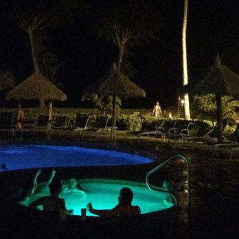 Aston Islander on the Beach - Enjoying the pool and hot tub at night - Resorts Near Me - Kapaa, Hawaii