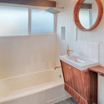 Synchro Properties & Management - a bathroom - General Contractors Near Me
