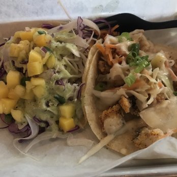 Pacific Coast Tacos - Grilled shrimp taco (left) and fried octopus taco. - Tacos Near Me - Houston, Texas Pacific Coast Tacos - Grilled shrimp taco (left) and fried octopus taco. - Tacos Near Me - Houston, Texas
