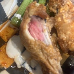 WingNutz - Undone chicken asked to be cooked hard and I get half cook wings