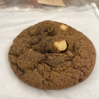 Craft Dessert Bar - a chocolate cookie with a bite taken out of it - Desserts Near Me