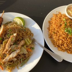 Allano's Catering Services - Pork skewers, pancit (noodles), pork ribs and rice.