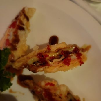 Sogo - a piece of pizza with sauce on it - Asian Fusion Near Me - Easton, Pennsylvania