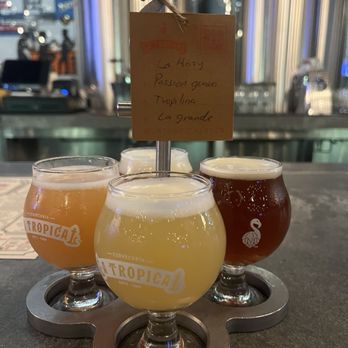 Cerveceria La Tropical - Craft beer flight- Hazy IPA, Passion Guava Sour, Tropilina, La Grande - Breweries Near Me - Miami, Florida Cerveceria La Tropical - Craft beer flight- Hazy IPA, Passion Guava Sour, Tropilina, La Grande - Breweries Near Me - Miami, Florida