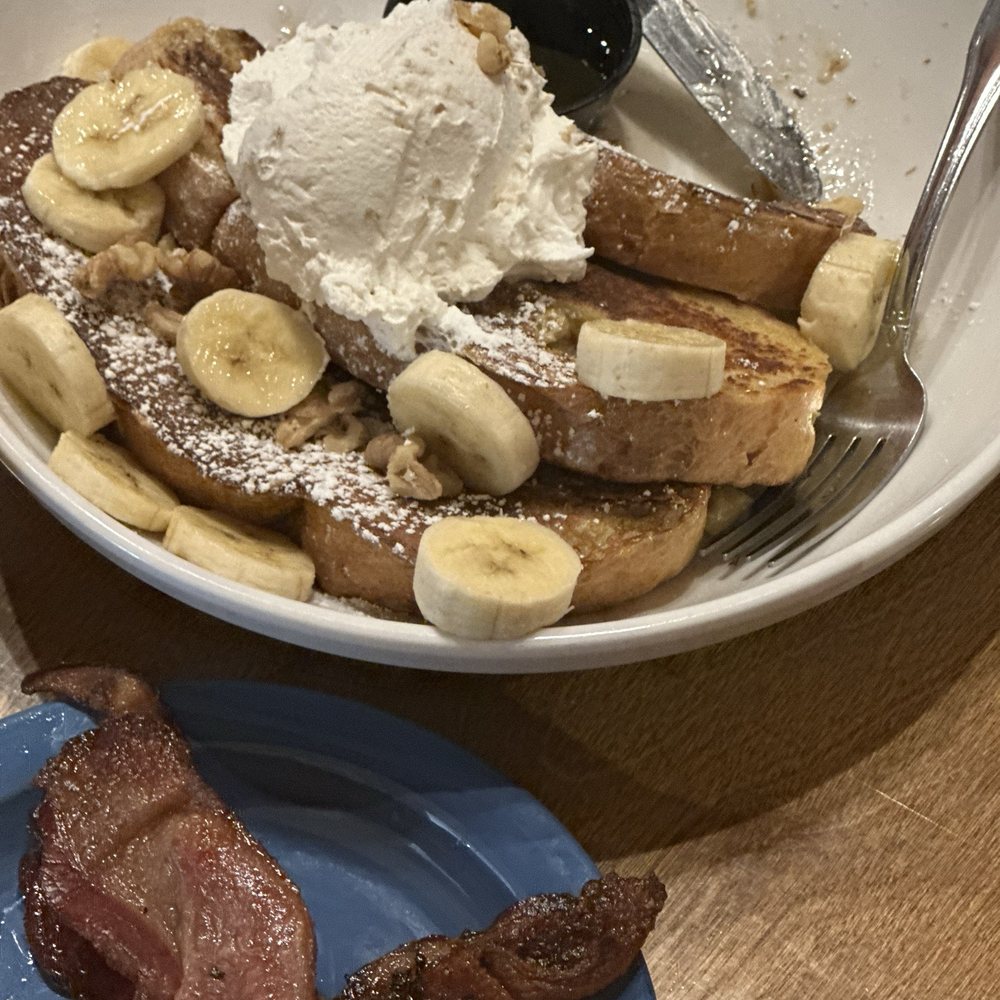 Cafe A La Cart - Bananas Foster French Toast!!!! Peppered bacon and freshly made banana pudding whuuuppppp cream!!! It was slappin!! - New American Near Me - Tucson, Arizona