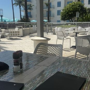 BRGR Kitchen & Bar - Treasure Island Beach Resort - Outdoor seating by the pool - New American Near Me - Treasure Island, Florida BRGR Kitchen & Bar - Treasure Island Beach Resort - Outdoor seating by the pool - New American Near Me - Treasure Island, Florida