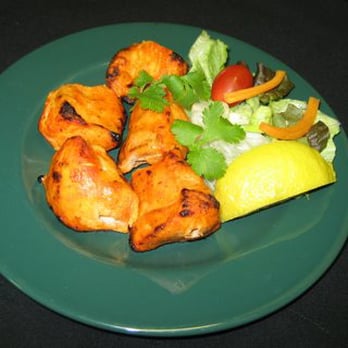 Mango Rain - a plate of chicken wings and a salad - Canadian (New) Near Me - Mississauga, Ontario Mango Rain - a plate of chicken wings and a salad - Canadian (New) Near Me - Mississauga, Ontario