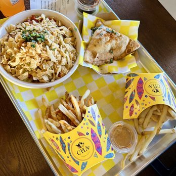 Cha Street Food - a tray of french fries, a bowl of coleslaw, and a bowl of salad - Indian Near Me - Sterling, Virginia