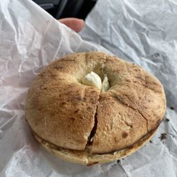 Rosemary and olive oil bagel with cream cheese Rosemary and olive oil bagel with cream cheese