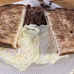 Peppermill Restaurant - Eggs, sausage patty and sour dough toast