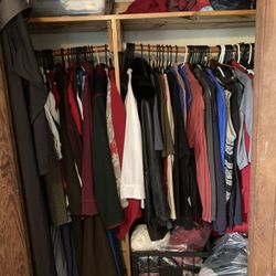 The Town's Inn - Closeup of somebody else's clothes in my closet
