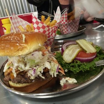 Cruiser's Cafe 66 - 1/2 lb. Angus burger w/pulled pork slaw and fries. - American Near Me - Williams, Arizona Cruiser's Cafe 66 - 1/2 lb. Angus burger w/pulled pork slaw and fries. - American Near Me - Williams, Arizona