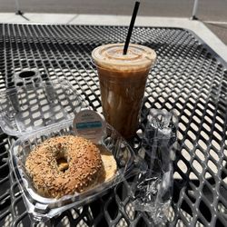 True Brew - Iced caramel macchiato w/extra espresso shot $8.10, and everything bagel with cream cheese $3.95. (3/27/2023)