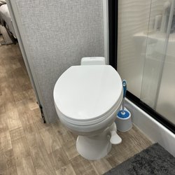 Champion RV Services - RV Washer dryer and toilet.