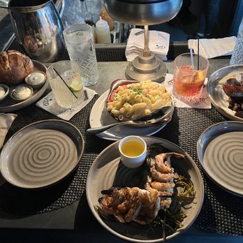 Arnette's Chop Shop - Bread with 3 types of butter, lobster mac and cheese, grilled shrimp, and beef ribs. - Steakhouses Near Me - Brookhaven, Georgia
