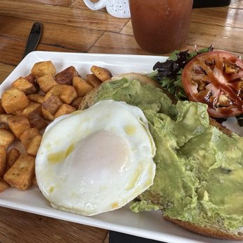 Bird & Cow - Avocado toast on sourdough. Crispy potatoes and yummy balsamic mini salad - New American Near Me - Breckenridge, Colorado Bird & Cow - Avocado toast on sourdough. Crispy potatoes and yummy balsamic mini salad - New American Near Me - Breckenridge, Colorado