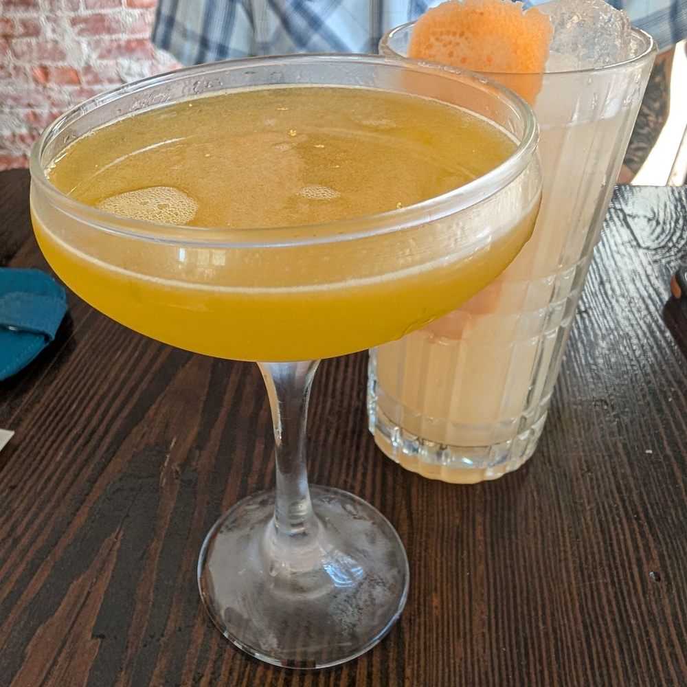 Grace and Proper - Good Giving & Game in the coupe and the Mockingbird in the highball glass. - Bars Near Me - Philadelphia, Pennsylvania