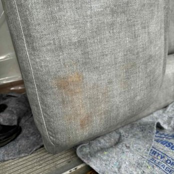 Johnson's Moving & More - Rust stained because they did not properly cover couch. - Movers Near Me - Seneca, Illinois