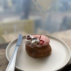 Perk Coffee And Doughnuts - "what a nutter" - Vegan PB&J filled, strawberry glazed and sugar coating with cream and strawberry gel toppings.