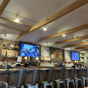 Mac & Walt's - Bar area plus there is ample table seating throughout, though these chairs aren't super comfortable. - Bars Near Me - Norton, Massachusetts Mac & Walt's - Bar area plus there is ample table seating throughout, though these chairs aren't super comfortable. - Bars Near Me - Norton, Massachusetts