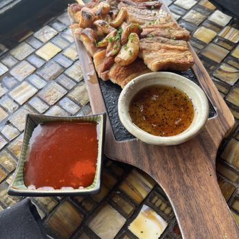 The Crouching Lion - Pork belly w salt and pepper and sauce on side - Beer Bar Near Me - Kaaawa, Hawaii The Crouching Lion - Pork belly w salt and pepper and sauce on side - Beer Bar Near Me - Kaaawa, Hawaii