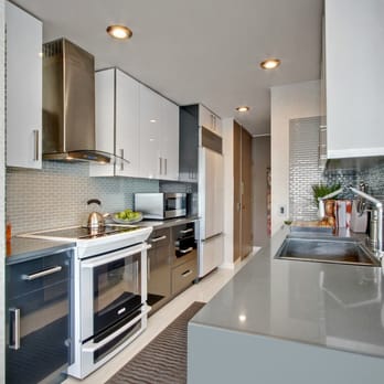 Pius Kitchen & Bath - Grey/White Flat Panel Acrylic with Concrete Quartz in Kirkland - Kitchen & Bath Near Me - Seattle, Washington