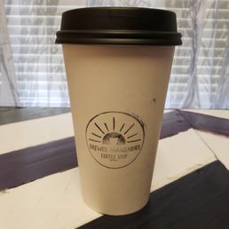 a coffee cup on a table a coffee cup on a table
