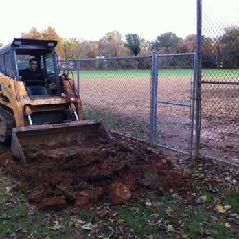 AMS Construction - Andrew grading the area so benches and chain link fencing can be built. - General Contractors Near Me - Warrenton, Virginia AMS Construction - Andrew grading the area so benches and chain link fencing can be built. - General Contractors Near Me - Warrenton, Virginia