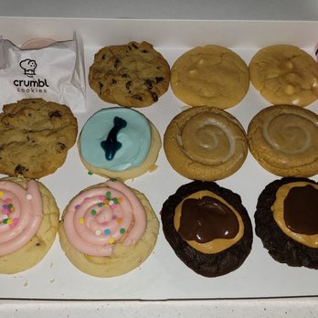 Crumbl - Rocklin - 12 pack with Confetti, Chocolate Chip, Sweet Shark, Honey Bun, regular Sugar Cookie, and Orange Creamsicle. - Bakeries Near Me - Rocklin, California Crumbl - Rocklin - 12 pack with Confetti, Chocolate Chip, Sweet Shark, Honey Bun, regular Sugar Cookie, and Orange Creamsicle. - Bakeries Near Me - Rocklin, California