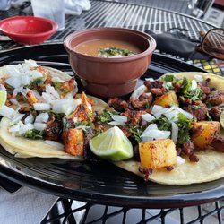 Tacos al pastor and cauliflower tacos