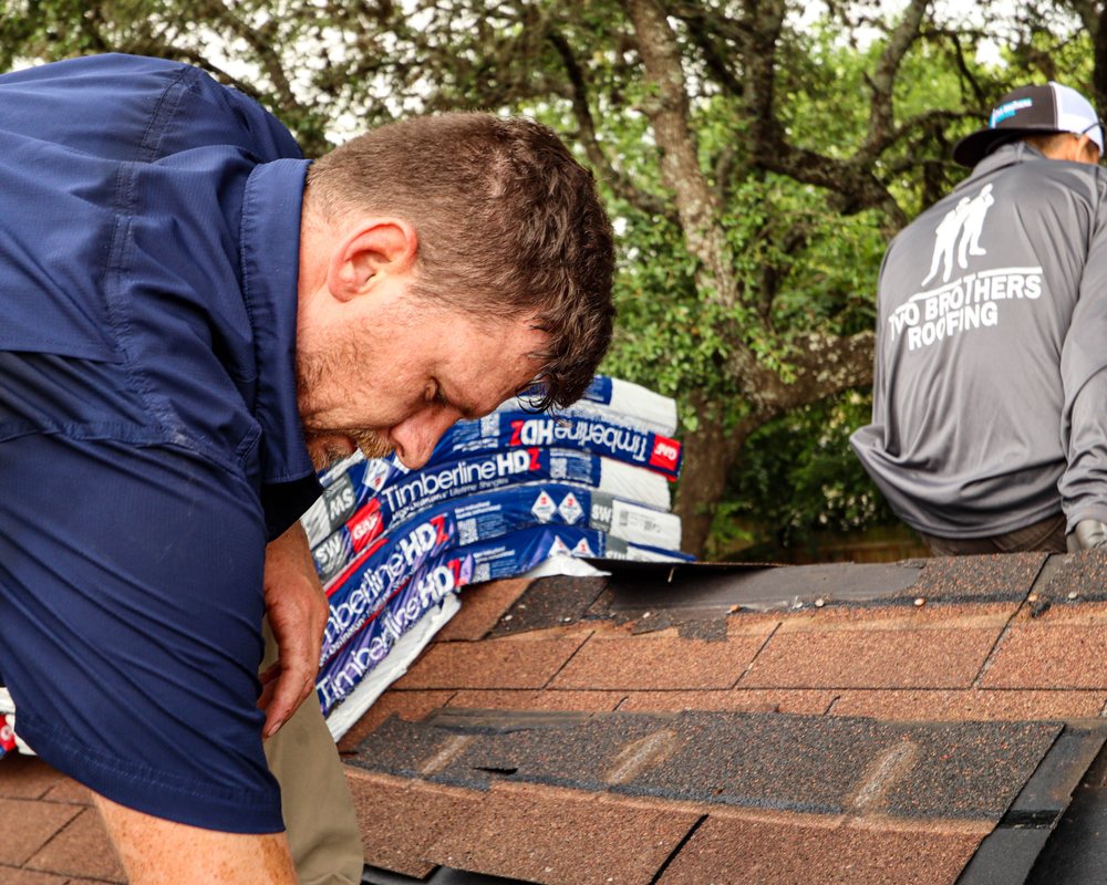 Slide of Two Brothers Roofing