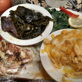 Carolina Kitchen - Grilled salmon with shrimp on garlic mashed potatoes with Mac and cheese and greens. - Soul Food Near Me - Brandywine, Maryland