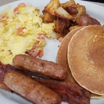 Kristof's Kafe - 2-2-2-2 eggs scrambled with tomato and onion - American Near Me - Davie, Florida