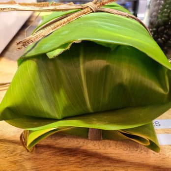 Moku Roots - To-go item wrapped in banana leaves - Vegan Near Me - Kula, Hawaii