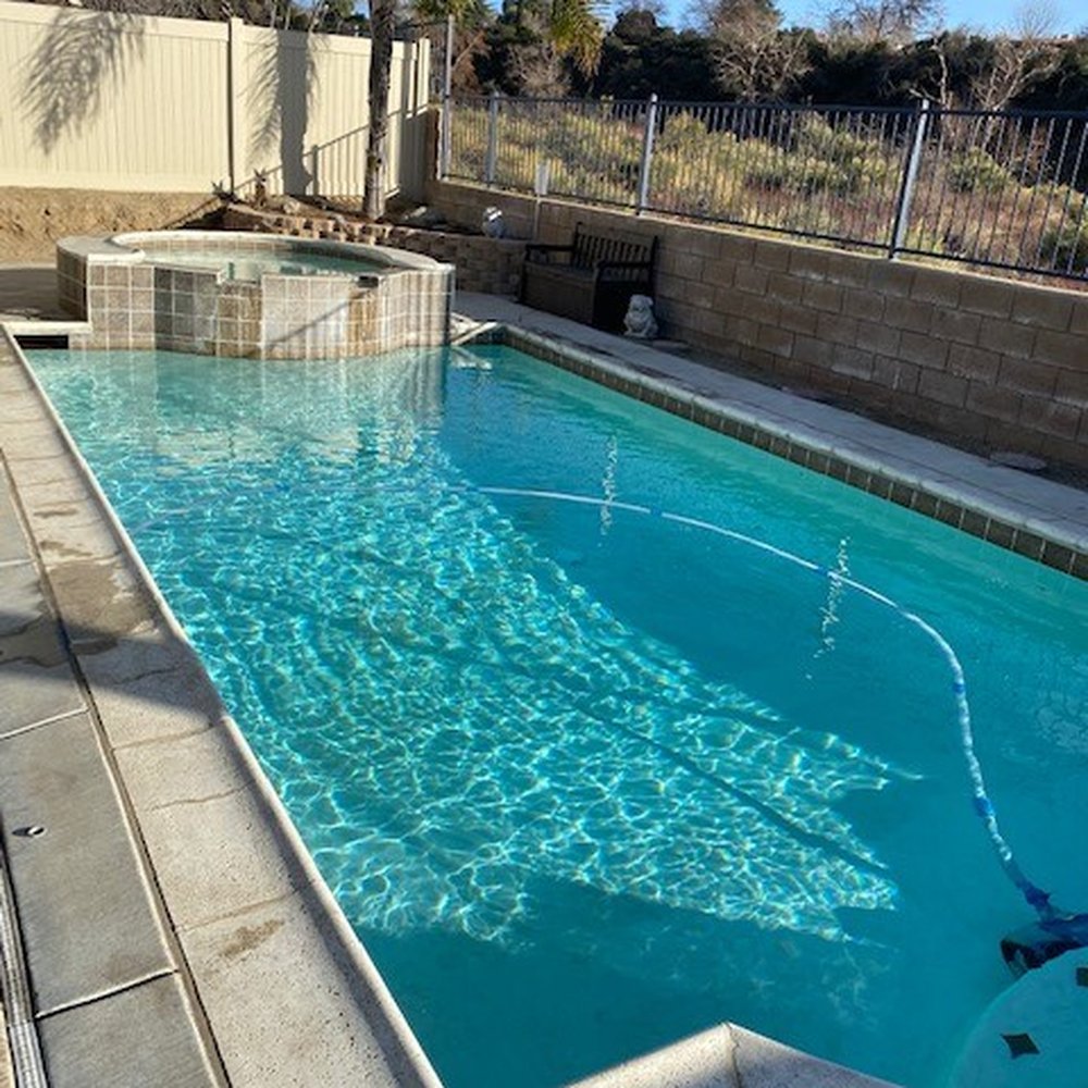 I E Pool Masters - Our sparkling pool and spa, thanks to Steve and Paline - Pool Cleaners Near Me