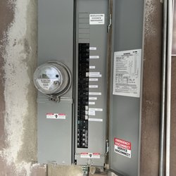 Steven J Clairmont Electric - New 200 amp panel installed and patched to handle EV load.
