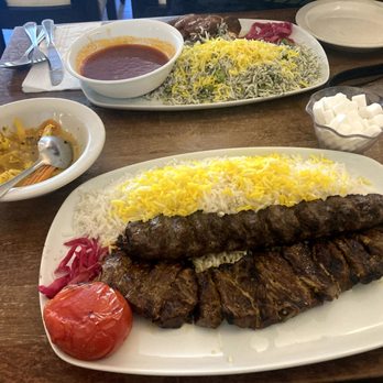 Persepolis Grill - Persian Tea Lamb Shank Persepolis Soltani Platter Torshi - Persian/Iranian Near Me - Seattle, Washington