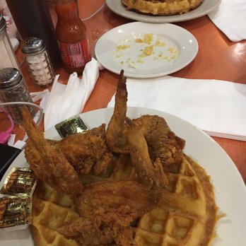 Amy Ruth's - Chicken and waffles front and pork chop and waffles back. - Southern Near Me - New York, New York