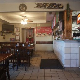 Inside of the Restaurant. It's a homely, intimate place. I like this decor. Inside of the Restaurant. It's a homely, intimate place. I like this decor.
