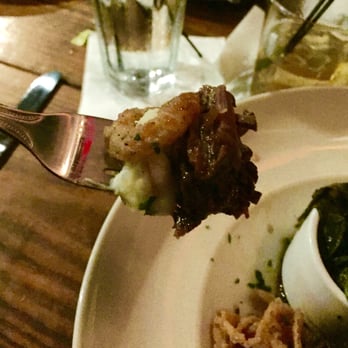 Oscar's - Close-up of the short ribs with mashed potato and crispy onion - American Near Me - Summerville, South Carolina Oscar's - Close-up of the short ribs with mashed potato and crispy onion - American Near Me - Summerville, South Carolina