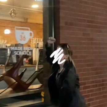 M36 Coffee Roasters - me happily pounding on the window in excitement to get my coffee - Coffee Roasteries Near Me - Ann Arbor, Michigan