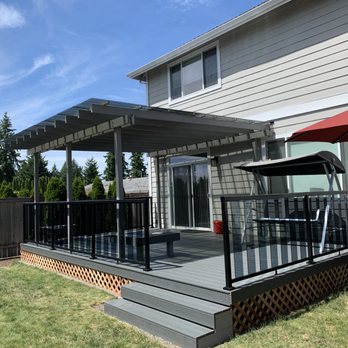Monkey’s Services - New deck, handrails and pergola covered! - Roofing Near Me Monkey’s Services - New deck, handrails and pergola covered! - Roofing Near Me