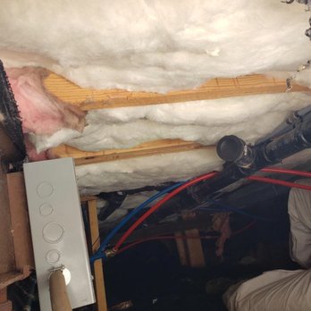 A Team Wildlife Removal and Trapping - New insulation being installed underneath manufactured home. - Wildlife Control Near Me A Team Wildlife Removal and Trapping - New insulation being installed underneath manufactured home. - Wildlife Control Near Me