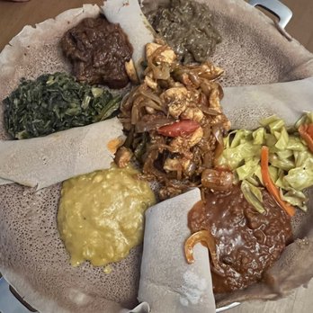 Demera - Family Style minimum of 3 people- (3-7) - Ethiopian Near Me - Chicago, Illinois Demera - Family Style minimum of 3 people- (3-7) - Ethiopian Near Me - Chicago, Illinois