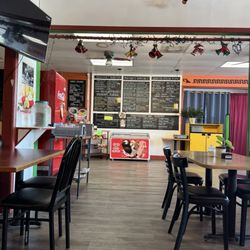 Mama Mayra's Kitchen - Menu and seating area