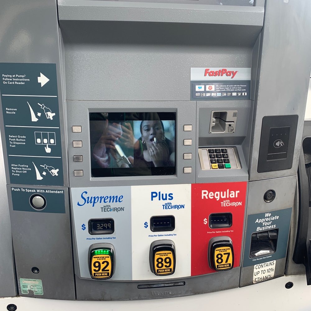a gas pump at a gas station a gas pump at a gas station