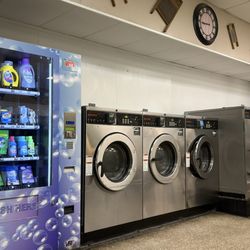 Park Avenue Coin Laundry - Vending machine with laundry supplies ranging from $2.50 - 5.00, two of the $4.75 washers and the $10 washer that holds up to 100 lbs.