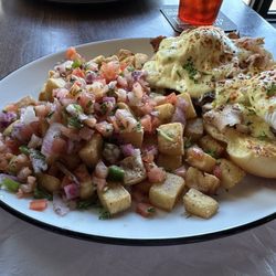 Eggs benny w/ smoked turkey & bacon; sunrise drink demolished